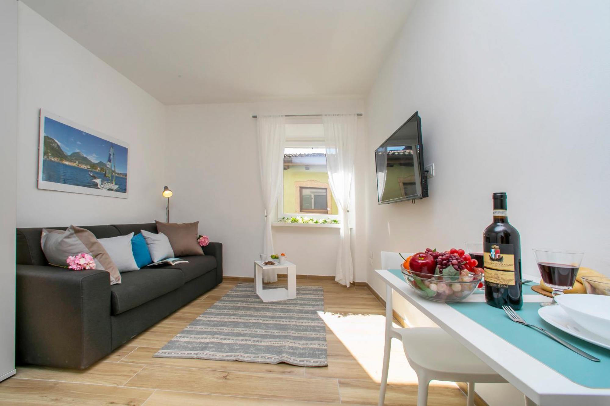 Nido Sui Tetti Di Riva Del Garda - Happy Rentals 外观 照片