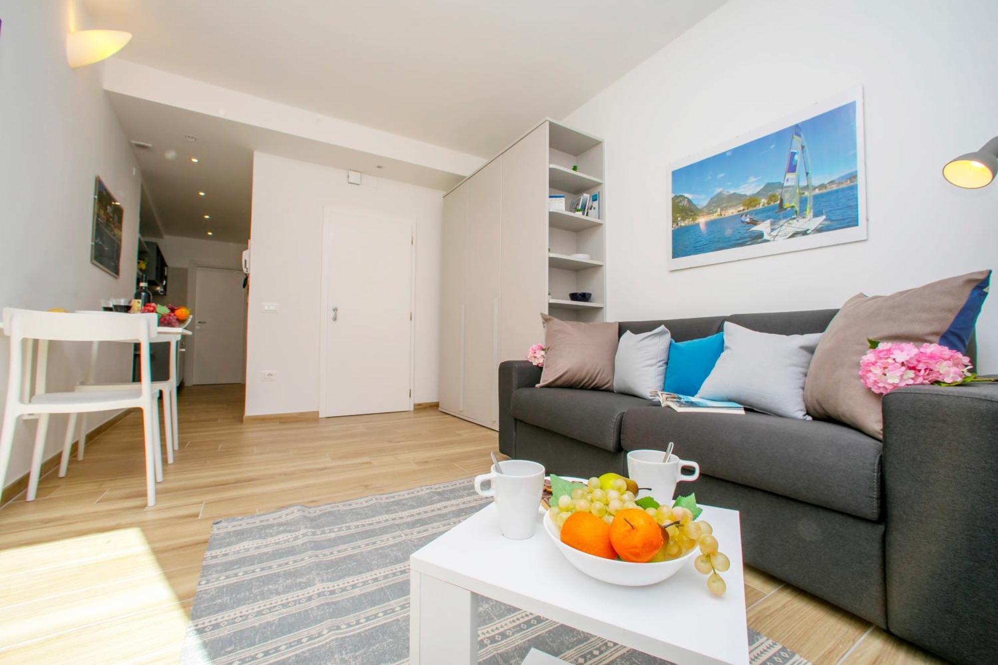 Nido Sui Tetti Di Riva Del Garda - Happy Rentals 外观 照片